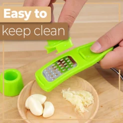 Reibe Knoblauch Küchenreibe Knoblauchreibe Multifunktionale Ingwer Grinding Grater Küchenhelfer Tools Edelstahl Schokolade Cutter Käse Muskat Zitrone Grün Retoo -Herd Gluck Verkäufe 64f932094466cb85477b386ea49527ec