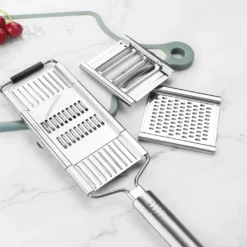 Gemüsehobel Multi-Karton-Packung Mit 3 Zusätzlichen Klingen Und Gemüseschäler -Herd Gluck Verkäufe 822663286668c665b5bce2cdff8f1a93 2